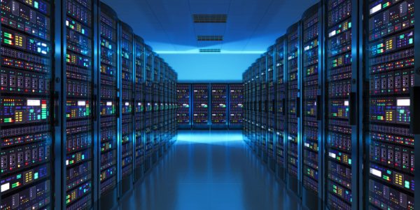 Modern web network and internet telecommunication technology, big data storage and cloud computing computer service business concept: server room interior in datacenter in blue light