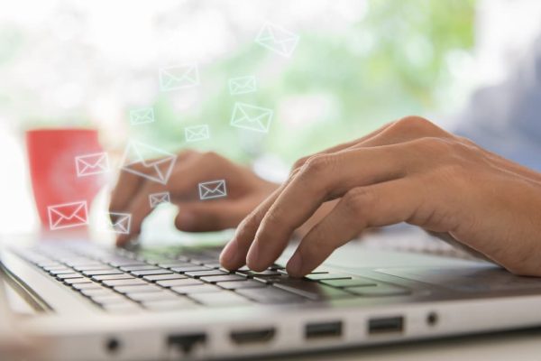 Newsletter,Concept,Hand,Of,A,Businessman,Checking,Message,Box,On